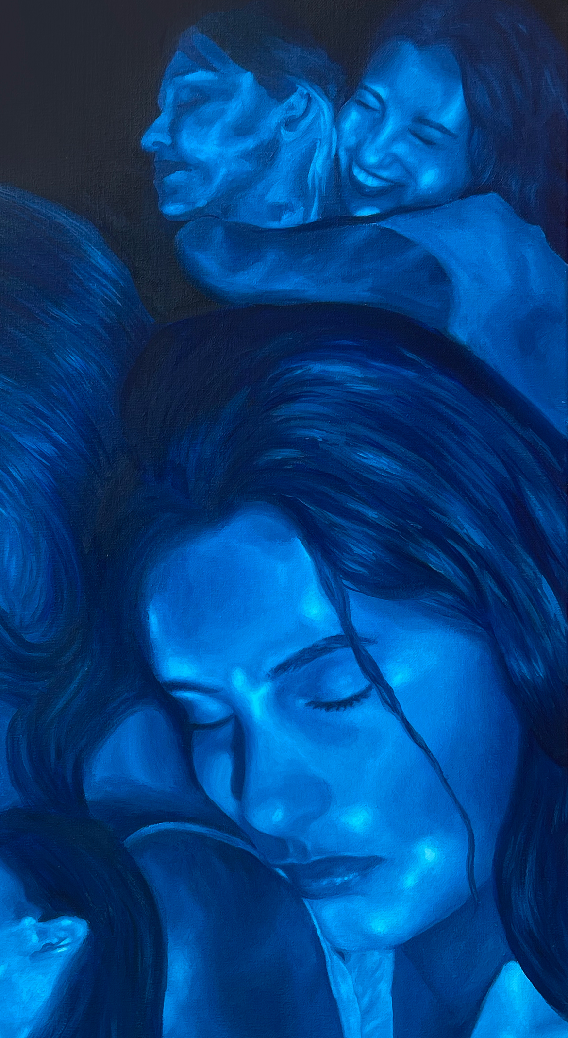 blue face of a girl with closed eyes, resting on someone's shoulder